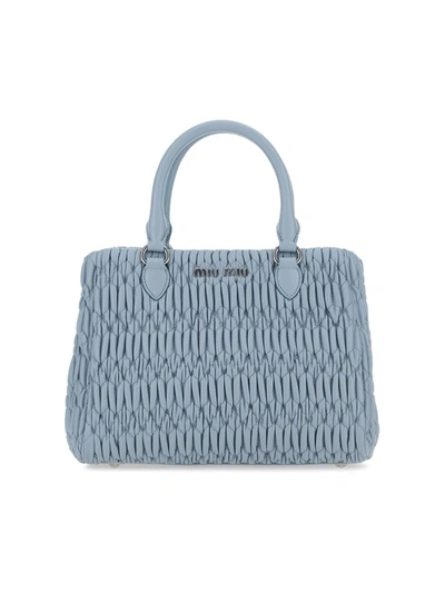 Shop Miu Miu Matelassé Handbag In Blue