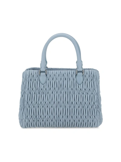 Shop Miu Miu Matelassé Handbag In Blue