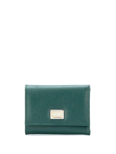 Shop Dolce & Gabbana Logo Plaque Trifold Wallet In Green