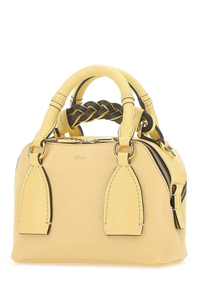 Shop Chloé Daria Small Tote Bag In Yellow