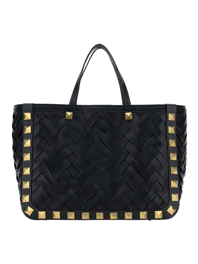 Shop Valentino Garavani Roman Stud Tote Bag In Black