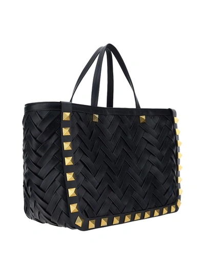 Shop Valentino Garavani Roman Stud Tote Bag In Black
