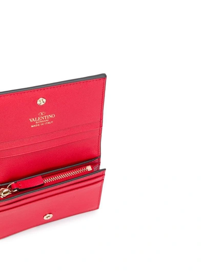 Shop Valentino Garavani Rockstud Folded Wallet In Red