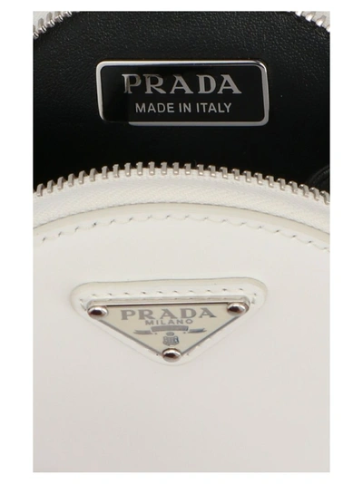 Shop Prada Round Mini Purse In White