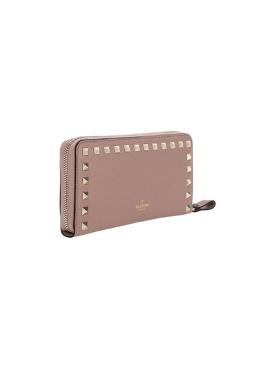 Shop Valentino Garavani Rockstud Zipped Wallet In Pink