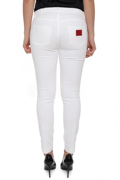 Shop Dolce & Gabbana Distressed Skinny Jeans In White