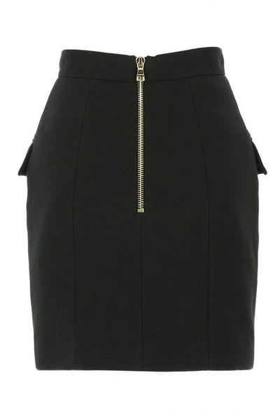 Shop Balmain Buttoned Mini Skirt In Black