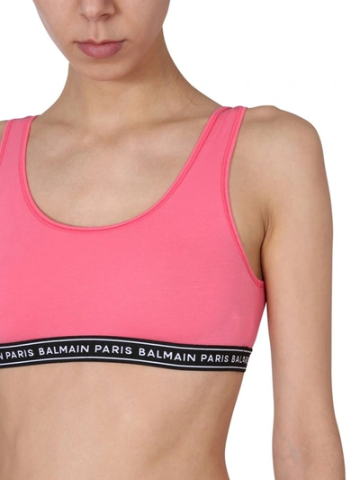 Shop Balmain Logo Tape Bra Top In Pink