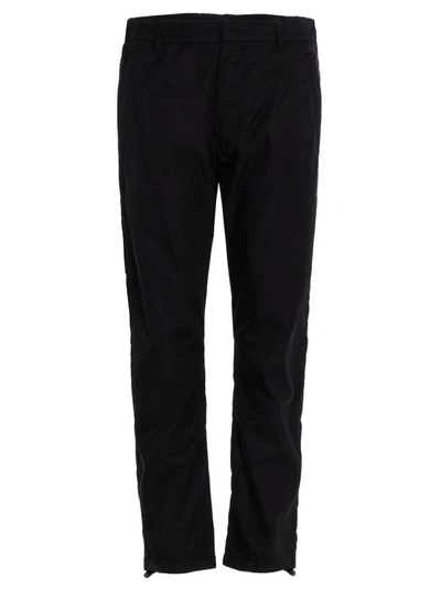 Shop Prada Logo Tapered Pants In Black