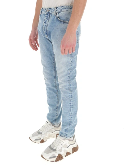 Shop Palm Angels Logo Print Jeans In Blue