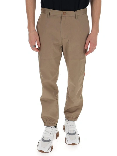 Shop Gucci Side Striped Trousers In Beige