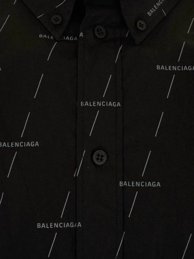 Shop Balenciaga Allover Logo Oversized Shirt In Black
