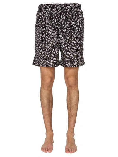 Shop Givenchy Allover Refracted Logo Swim Shorts In Multi