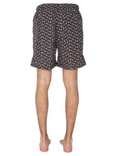 Shop Givenchy Allover Refracted Logo Swim Shorts In Multi