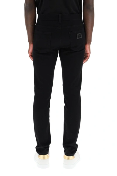 Shop Dolce & Gabbana Logo Patch Skinny Jeans In Black