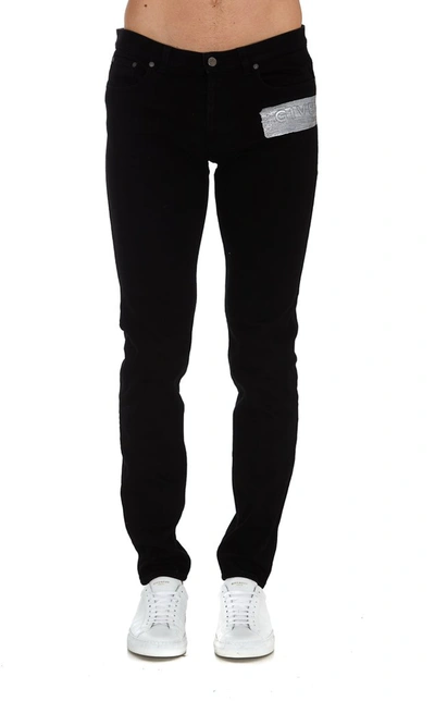 Shop Givenchy Logo Band Skinny Jeans In Black
