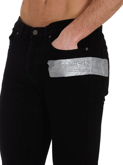 Shop Givenchy Logo Band Skinny Jeans In Black