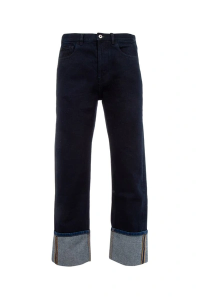Shop Valentino Vlogo Cuffed Jeans In Blue