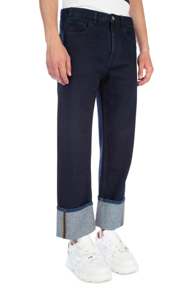 Shop Valentino Vlogo Cuffed Jeans In Blue