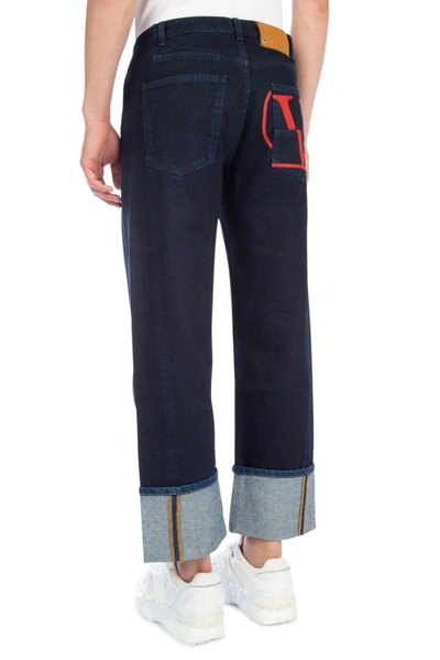 Shop Valentino Vlogo Cuffed Jeans In Blue