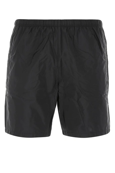 Shop Prada Triangle Logo Swim Shorts In Black