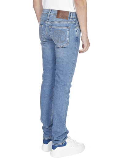 Shop Moschino Washed Slim Fit Jeans In Blue