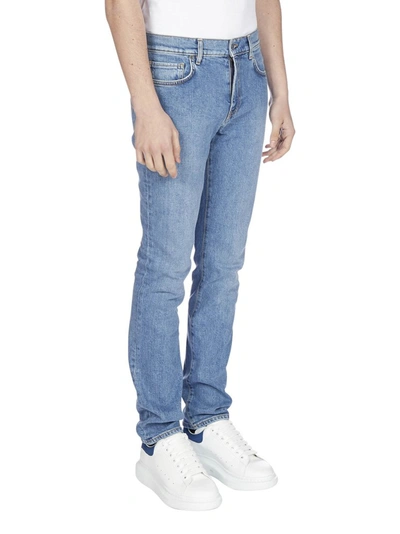 Shop Moschino Washed Slim Fit Jeans In Blue