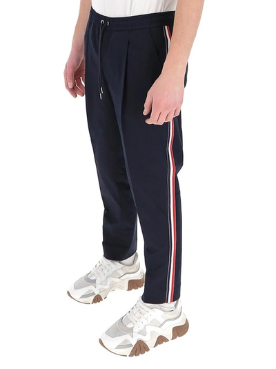 Shop Moncler Side Stripe Drawstring Trousers In Navy