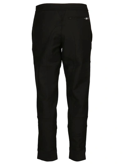 Shop Alexander Mcqueen Slim Fit Trousers In Black