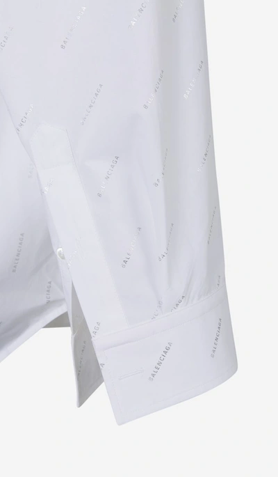 Shop Balenciaga Allover Logo Oversized Shirt In White