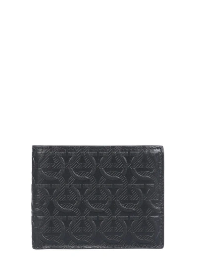 Shop Ferragamo Salvatore  Gancini Embossed Wallet In Black