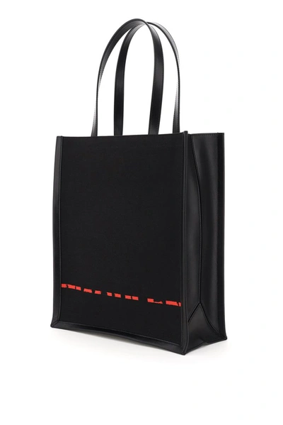 Shop Alexander Mcqueen Graffiti Logo Tote Bag In Black