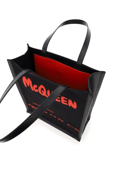 Shop Alexander Mcqueen Graffiti Logo Tote Bag In Black