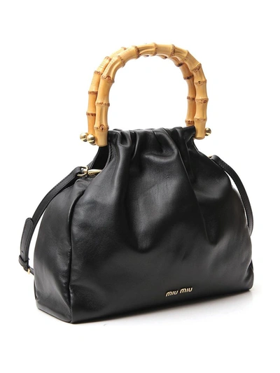 Shop Miu Miu Bamboo Detail Handbag In Black