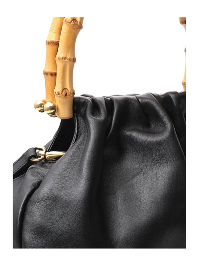 Shop Miu Miu Bamboo Detail Handbag In Black