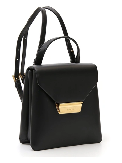 Shop Prada Logo Plaque Mini Backpack In Black