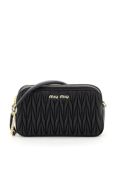 Shop Miu Miu Matelassè Shoulder Bag In Black