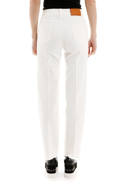 Shop Stella Mccartney Unfinished Hem Straight Fit Jeans In White