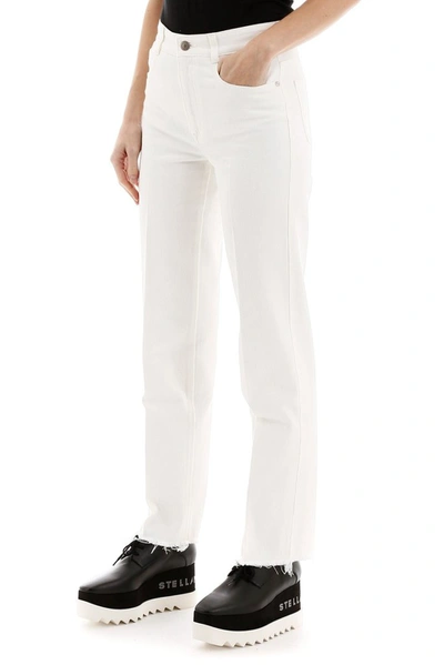 Shop Stella Mccartney Unfinished Hem Straight Fit Jeans In White