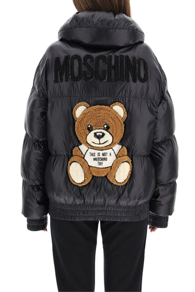 Shop Moschino Teddy Embroidered Puffer Jacket In Black
