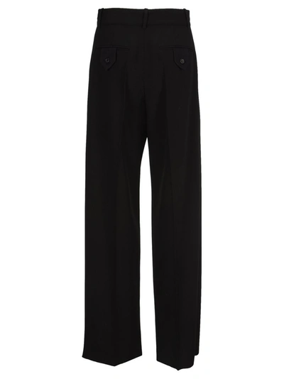 Shop Valentino Techno Granité Trousers In Black