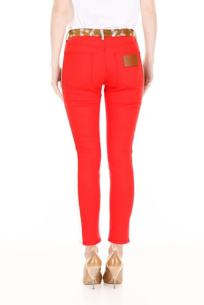 Shop Burberry Side Stripe Animalier Waist Band Jeans In Red