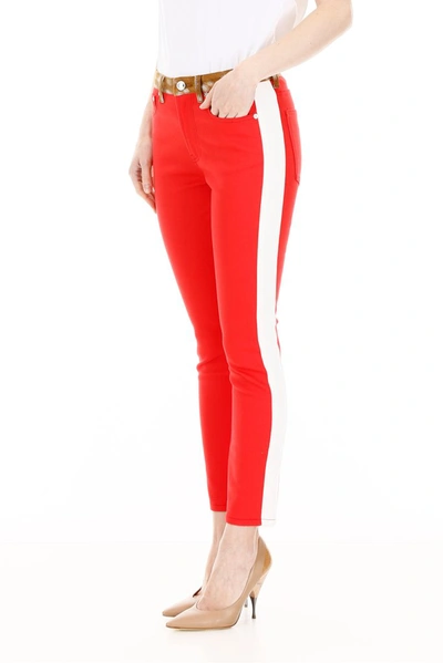 Shop Burberry Side Stripe Animalier Waist Band Jeans In Red