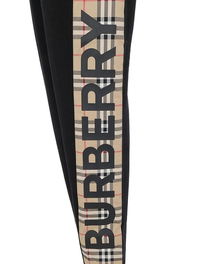 Shop Burberry Check Stripe Track Pants In Black