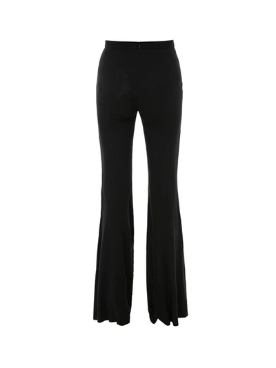 Shop Balmain Flared Trousers In Black