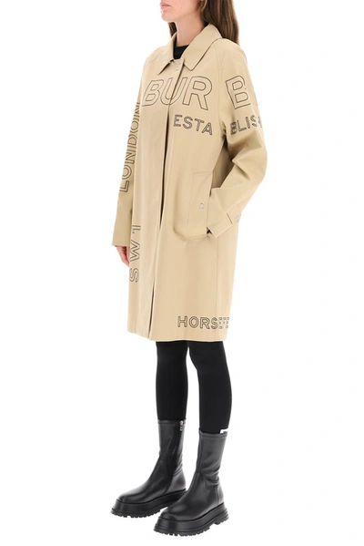 Shop Burberry Horseferry Print Trench Coat In Beige