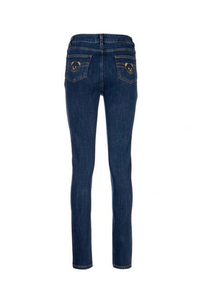 Shop Moschino Teddy Embroidered Jeans In Blue