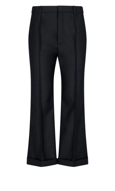 Shop Saint Laurent Flared Trousers In Black