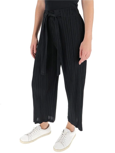 Shop Issey Miyake Pleats Please By  Pleated Trousers In Black