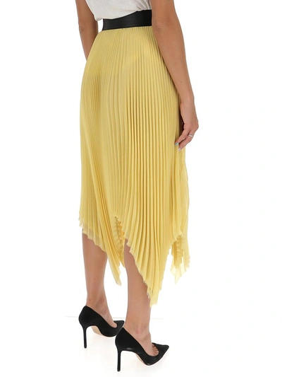 Shop Loewe Asymmetric Pleated Skirt In Yellow